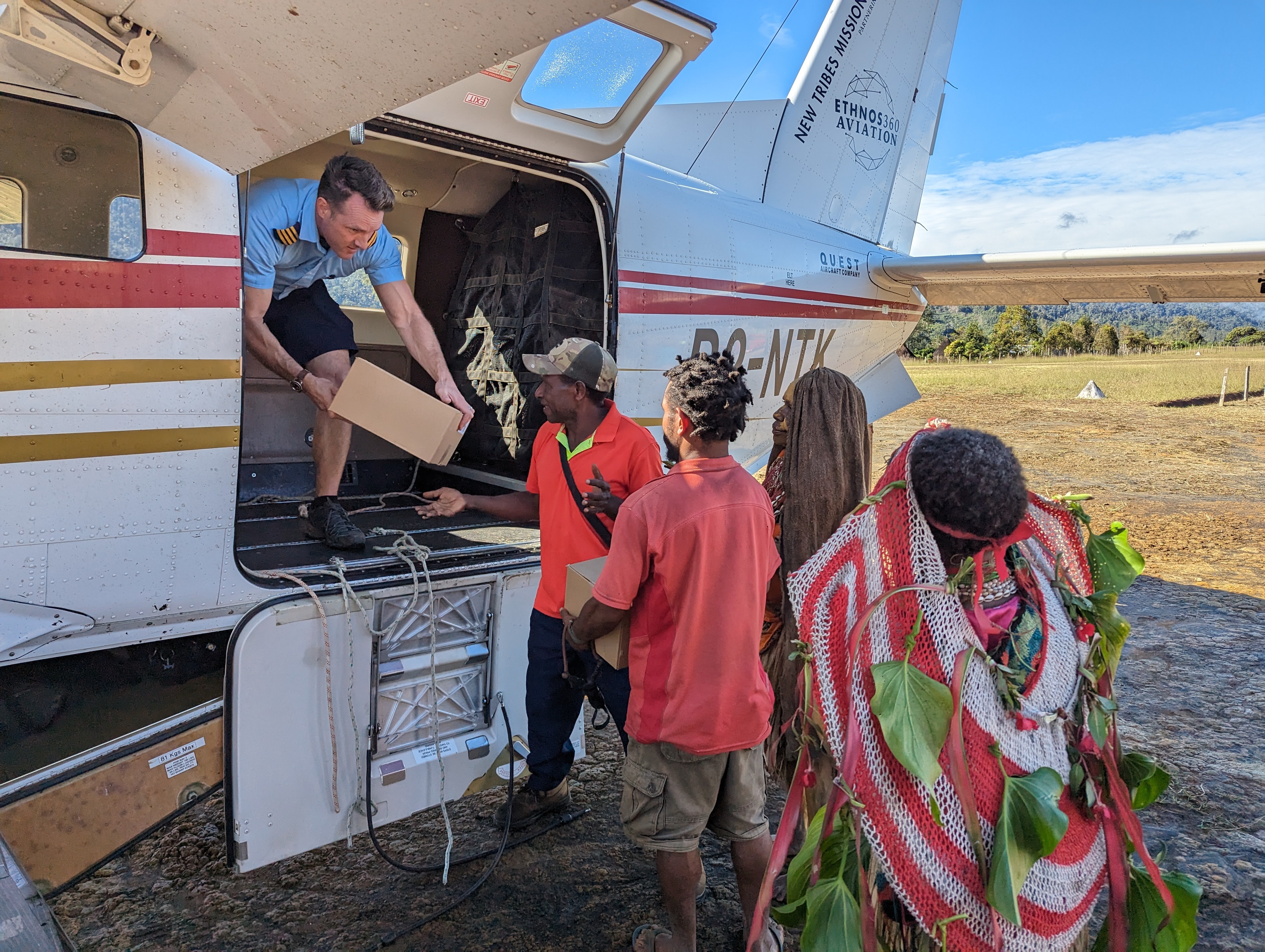 Pilot Ryan Farran delivers the first copies of the Simbari NT